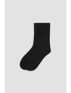 Calcetín de mujer con puño...